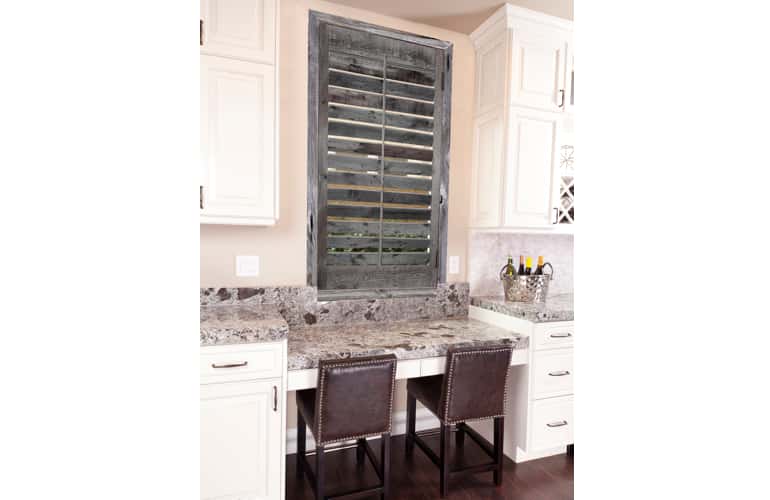 Reclaimed wood shutters on kitchen window in Destin